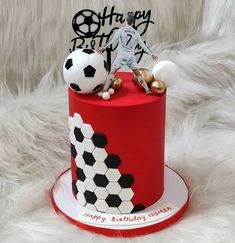 a soccer themed birthday cake on a white furnishing