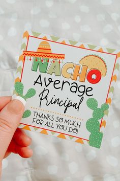 a person holding up a card that says nacho average principals thanks so much for all you do