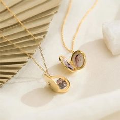 Looking for a unique and meaningful gift for Mom, Grandma, or a new mom? Our Photo Locked Necklace is the perfect choice! This custom picture necklace features a flip oval pendant that can be engraved with initials and holds a significant photograph close to the heart. It's not just a necklace; it's a cherished memory captured in a beautiful locket. Whether it's for Mother's Day, a birthday, or just to show your love, this necklace is sure to make her smile. Give the gift of cherished memories w Round Locket Necklace For Mom, Elegant Personalized Locket Necklace For Mom, Round Pendant Locket Necklace For Mom, Mother's Day Medallion Locket Necklace Gift, Dainty Oval Pendant Locket Necklace For Gifts, Mother's Day Keepsake Pendant Locket Necklace, Pendant Locket Necklace For Mother's Day Keepsake, Personalized Medallion Locket Necklace For Mother's Day, Personalized Oval Jewelry Gift For Mom