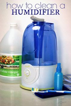 a blue water bottle sitting on top of a counter next to a toothbrush and soap dispenser