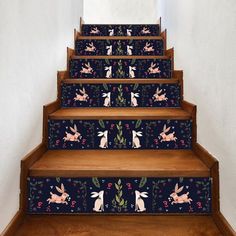 the stairs are decorated with bunnies and flowers