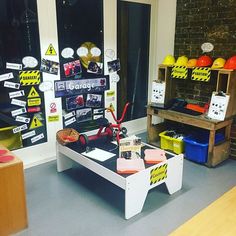 a room filled with lots of clutter and construction signs on the windowsills