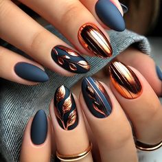 Get ready to turn heads with this bold copper foil and matte navy combo! The deep matte navy base adds a rich, sophisticated vibe, while the copper foil gives it an extra pop of glam. Perfect for evening events or a stylish autumn day, this nail design is sure to make a statement. Whether you're going for a chic or edgy look, this combo is the perfect blend of fall elegance. Save this pin if you're into bold fall nail trends! Jelly Roll Nails, Nail Art Designs Autumn 2024, Foil Fall Nails, November Nails Fall Matte, Black And Gold Fall Nails, Fall Jewel Tone Nails, Fall Nails With Gold Foil, Navy Autumn Nails, Navy Nail Designs Fall