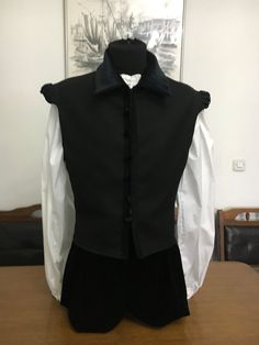 A very rustic black  vest with velvet buttons. You can wear it in different occasions like renaissance fairs or simple costume parties.   If you're not sure which size to choose, specify your measurements in the Note to Seller section and you will be sent the best size for you. If you have any questions or you want something that is not available in our shop, let us know in a private message. Medieval Prince Outfit, Fairy Tiktok, Medieval Noble, Victorian Pants, Pirate Vest, Victorian Vest, Costumes Faciles, Outfit Builder, Pirate Aesthetic