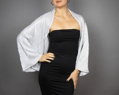 A very elegant and comfortable sleeves wrap for your wedding dress, evening dress or party outfit made of the finest stretch fabric, very soft.  Color :white silver metallic  Size : unique ( fits all ) , but if you have any doubts, please contact me We accept credit cards! Elegant Fitted Wedding Cape, Elegant Party Cape With Cape Sleeves, Elegant Party Capelet, Elegant Evening Capelet With Cape Sleeves, Elegant Capelet For Party, Elegant Fitted Capelet For Evening, Elegant Black Capelet For Party, Elegant Evening Capelet, Elegant Black Party Capelet