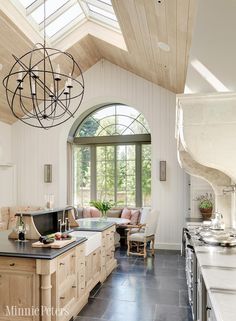 the kitchen is clean and ready to be used as a living room or dining area