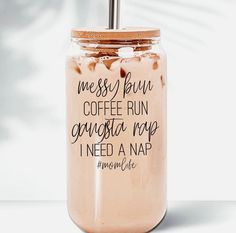 a mason jar with a straw in it that says messy rum coffee run, granola pop, i need a nap