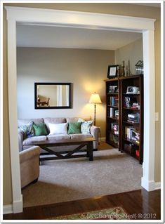 the living room is clean and ready for us to use it's new furniture