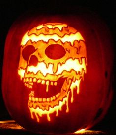 a pumpkin carved to look like a skull