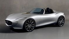 an artist's rendering of the new mazda roadster concept car is shown in this image