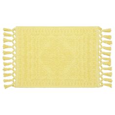 a yellow rug with tassels on the bottom and fringed edges, against a white background