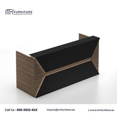 an office desk with black top and wood trimmings on the front, along with a white background