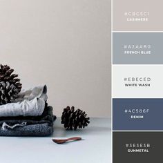 the color scheme is grey, white and gray with some pine cones on top of it