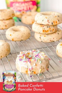 baked confetti pancake donuts with sprinkles on a cooling rack