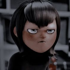 an animated doll with black hair and blue eyes looks at the camera while standing in front of a counter