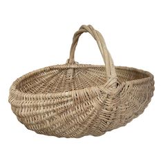 a wicker basket with handles on a white background