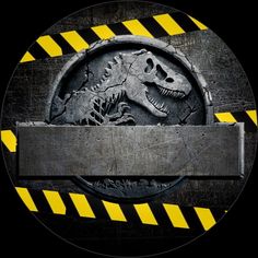 a close up of a metal plate with a dinosaur on it