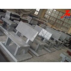 several different types of benches in a warehouse