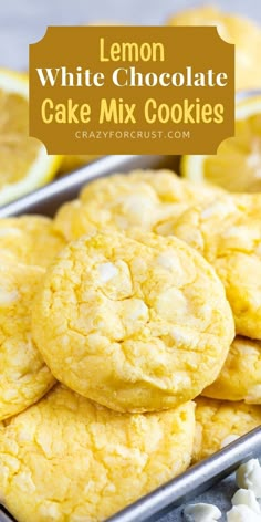 lemon white chocolate cake mix cookies stacked on top of each other in a baking pan