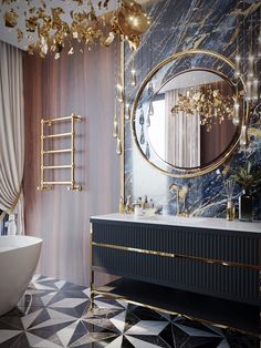 a bathroom decorated in black, gold and white with a round mirror on the wall