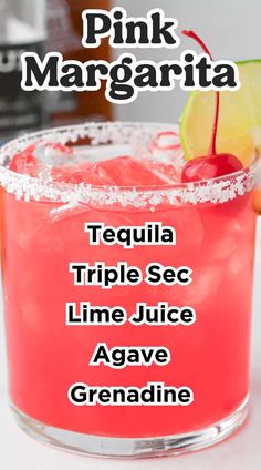 the pink margarita is served in a glass with a lime slice and garnish