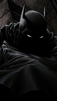 the dark knight is laying down with his head on his chest