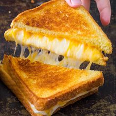 a grilled cheese sandwich with melted cheese