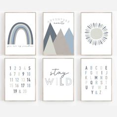 four wall art prints with mountains, clouds and rainbows in different colors on them