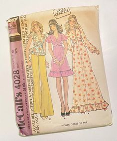 an old sewing book with two women's dresses and one woman's top