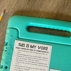 a blue plastic case with writing on it and a yellow pencil next to it that says, this is my voice