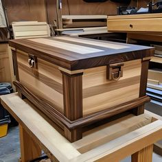 a large wooden box sitting on top of a table