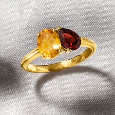 Ross-Simons - 1.10ct Citrine, .90ct Garnet Toi et Moi Ring Over Sterling. Size 9. French for "you and me," Toi et Moi rings are a unique way to celebrate a special relationship in your life. Wear our on-trend, two-stone designs as a sentimental symbol of romance, friendship, family - or simply treat yourself to double the sparkle! This fiery statement features a 1.10 carat oval citrine shimmering beside a .90 carat pear-shaped garnet. Crafted in polished 18kt yellow gold over sterling silver. 1/4" wide. Garnet and citrine two-stone ring. Garnet birthstones are the perfect gift for January birthdays. Ruby And Citrine Ring, Yellow Garnet Ring, Multi-stone Citrine Topaz Ring, Gold Garnet Multi-stone Ring, Yellow Gold Garnet Multi-stone Ring, Garnet Birthstone, Citrine Ring, Stone Design, Garnet Rings