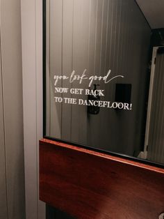 a bathroom mirror with the words you got back to the dancefloor written on it