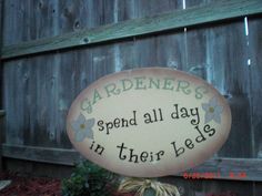 a sign that says gardener's spend all day in their beds