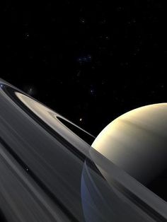 an artist's rendering of saturn and its moon