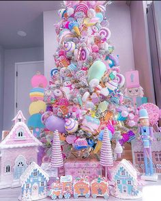 a christmas tree decorated with lots of candy