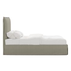 an upholstered bed with white linens and pillows on the headboard, against a white background