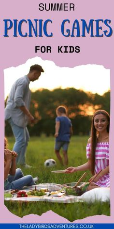 a group of people sitting on top of a grass covered field next to each other