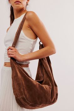 Effortlessly functional, this tote bag is featured in a slouchy hobo style with two elongated shoulder straps, all in soft suede fabrication with zipper closure for the perfect go-to bag. * Fully lined * Zipper closure * Fixed straps | Roma Suede Tote Bag by Free People in Brown Chic Soft Suede Hobo Bag, Slouch Bag, Brown Hobo Bag, Versatile Suede Hobo Shoulder Bag, Everyday Suede Hobo Bag With Zipper Closure, Suede Bag, Suede Bag Outfit, Brown Suede-lined Hobo Bag For Everyday, Hobo Bag Outfit