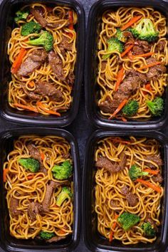 four plastic containers filled with beef and noodles