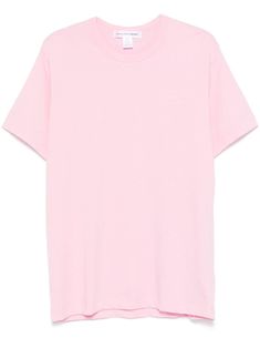 a pink t - shirt on a white background