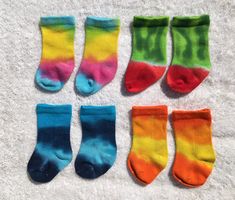 "This listing if for one pair of really cool tie dye bamboo socks in your choice of color and size! Sizes: Newborn-six months: infant shoe size 0-1 12 months: infant shoe size 1-4.5 24 months: kids' shoe size 3-7 Colors: Rainbow Pastel Rainbow Blue Green Purple Yellow/orange Watermelon Bamboo socks are soft and cozy, 94% bamboo/6% spandex. These are crew style. Please indicate size in \"message from buyer\". If you want more than one pair, we'll offer a discount of 10% on orders of two or more s Orange Watermelon, Purple Yellow Orange, Rainbow Pastel, Baby Shoe Sizes, Bamboo Socks, Cool Ties, Kids Socks, Cool Socks, Pastel Rainbow