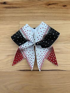 "3\" x 28\" grosgrain ribbon with glitter heat transfer vinyl and ponytail elastic attached. Finished product 7\" wide by 7\" tall.  \"Price per bow\" All bows are customizable: we can do it in your colors, with your team name/ mascot/logo in YOUR budget, Just message me for information on how to place your custom order.  Materials and fabrics can be substituted. We do not warranty hair elastics as they are not manufactured by us. All custom orders and bows with names/initials/monograms etc are Pink Cheer Bows, Competition Cheer, Competition Bows, Custom Cheer Bows, Glitter Cheer Bow, Homemade Bows, Glitter Heat Transfer Vinyl, Competitive Cheer, Custom Bows