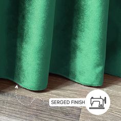 a close up view of a green curtain with the word sewed finish on it