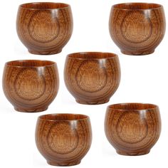 six wooden bowls sitting side by side on a white background