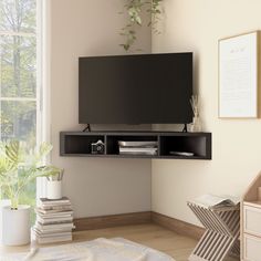 a living room with a large flat screen tv mounted to the side of a wall