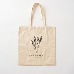 a tote bag that says lavender on the front and side with flowers in black ink