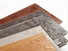 several different types of wood flooring laid out on top of each other with the same color and pattern