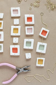 there are many small pieces of plastic that have been made into necklaces