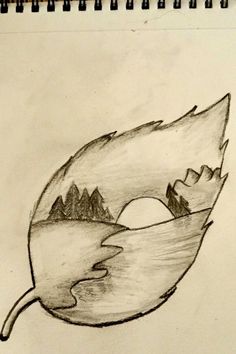 a pencil drawing of a leaf with mountains in the back ground and water on it